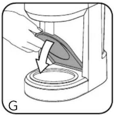 Illustration of a hand pressing down on a circular component with an arrow indicating force or direction (no text or symbols)