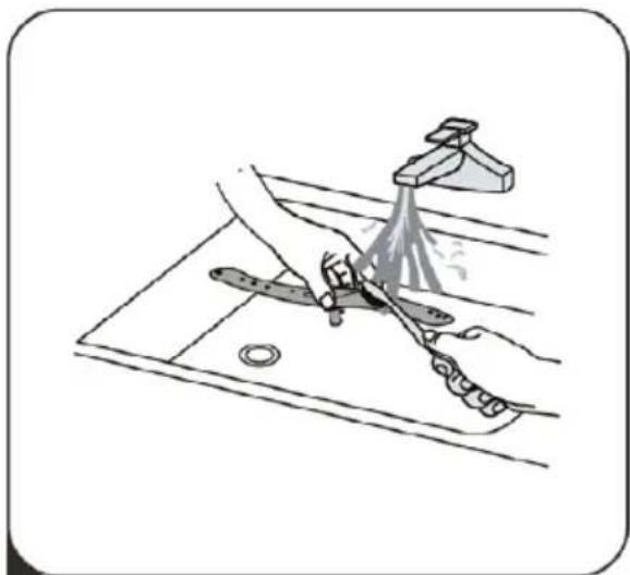 Illustration of a hand using a tool to clean or spray liquid onto a surface, with no text or symbols present.