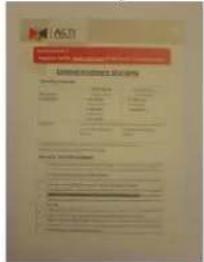 Scanned document with red header and table of contents, likely a form or report