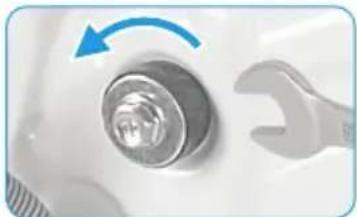 Close-up of a mechanical component with a wrench and circular knob, no visible text or symbols