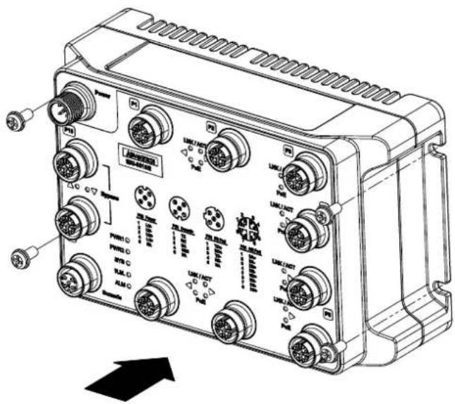 Technical diagram of an industrial control unit with labeled ports and indicator lights, showing internal components and directional arrows.