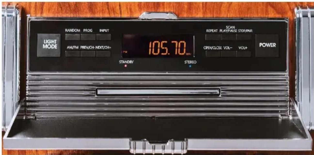 LIGHT MODE RANDOM PROG INPUT AM/FM PREV/CH-NEXT/CH+ STANDBY STEREO 105.70 MHz SCAN REPEAT PLAY/PAUSE STOP/PWR OPEN/CLOSE VOL- VOL+ POWER