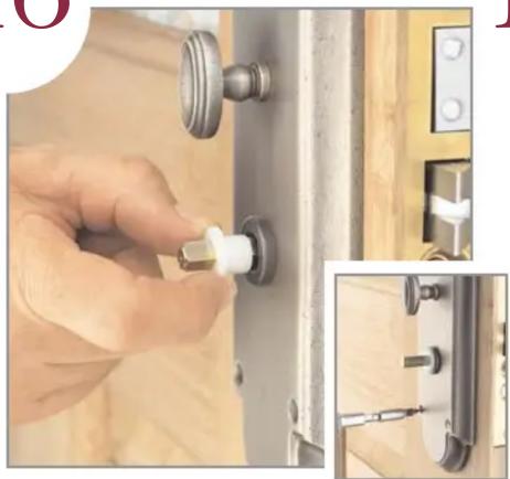 Close-up of a hand adjusting a small white plastic component on a door lock, with an inset close-up showing the same tool (no text or symbols visible)