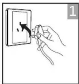 Hand holding a switch to open a wall socket, no text or symbols visible.