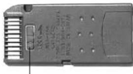 Close-up of a mechanical component with ribbed and mounting holes (no visible text or symbols)