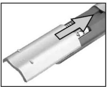 Close-up of a metallic cylindrical component with a black arrow pointing to a small feature (no text or symbols visible)