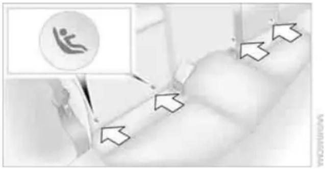 Medical or healthcare image showing a person in a wheelchair with directional arrows and a circular icon containing a figure symbol.