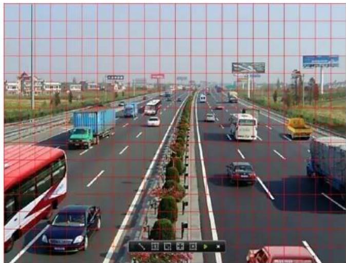 Highway scene with multiple vehicles and traffic, overlaid with a grid overlay showing road markings (no readable text or symbols)