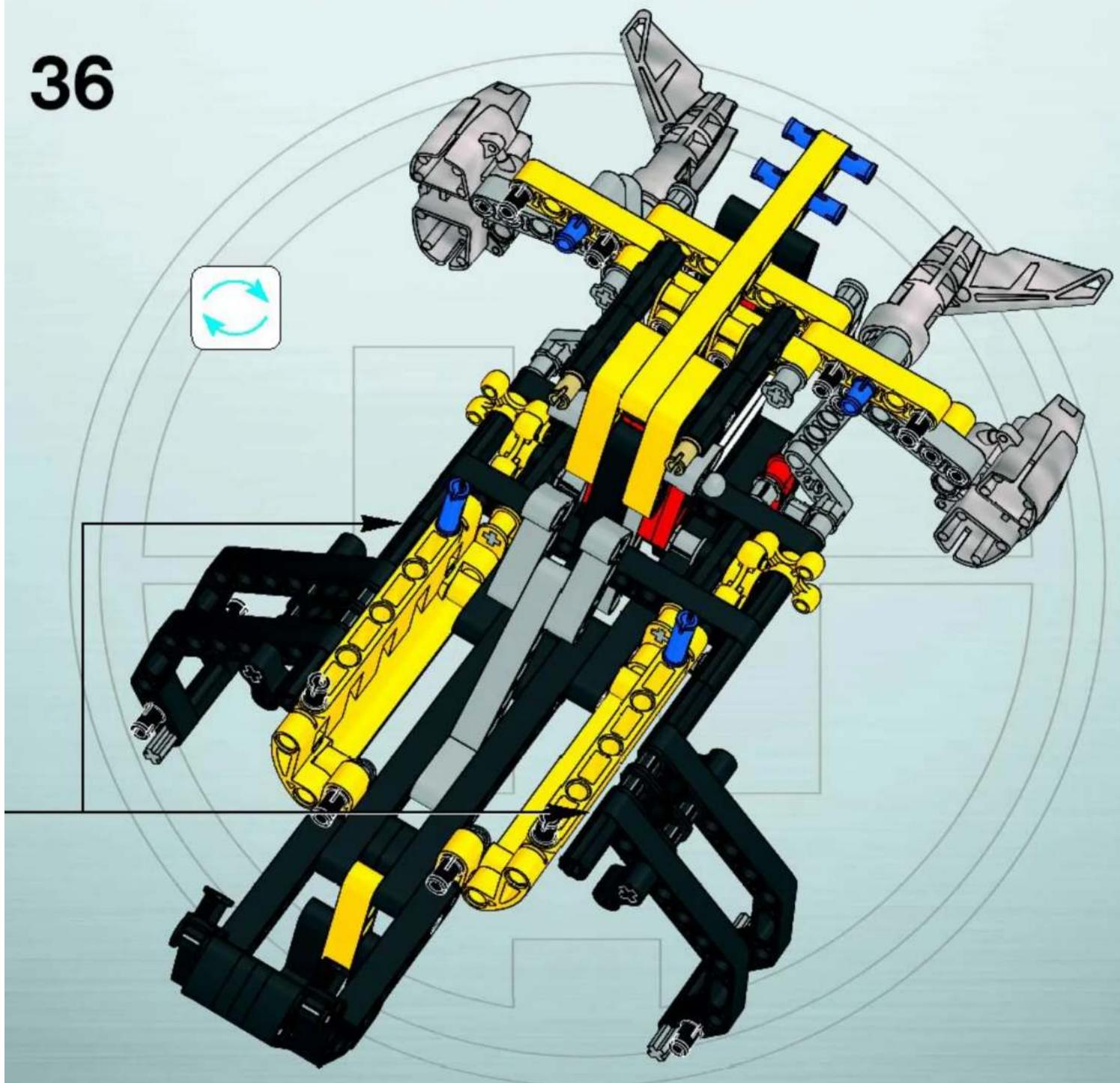 3D mechanical assembly diagram of a robotic vehicle with yellow and black components, no visible text or symbols