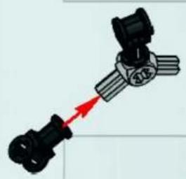Diagram of a mechanical assembly with two black components and a red arrow indicating direction (no text or symbols)