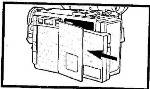 Technical line drawing of a mechanical device with a black arrow pointing to a component (no text or symbols present)
