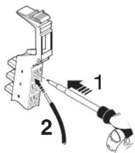 Diagram showing a tool interacting with an electrical component, labeled with parts 1 and 2.