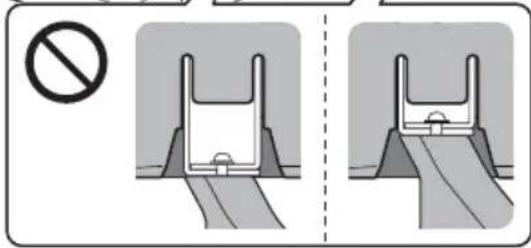 Safety warning illustration showing a no-smoking symbol and two safety diagrams with different shapes.