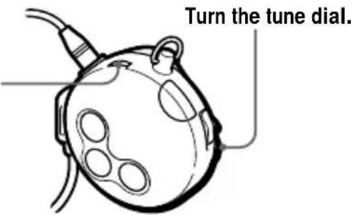 Turn the tune dial.