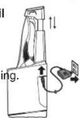 PANASONIC ES-RT74 - Charging using the self-cleaning recharger - 2