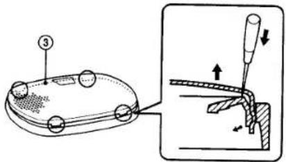 Technical diagram showing a device with labeled components and a magnified view of a tool interacting with a surface.