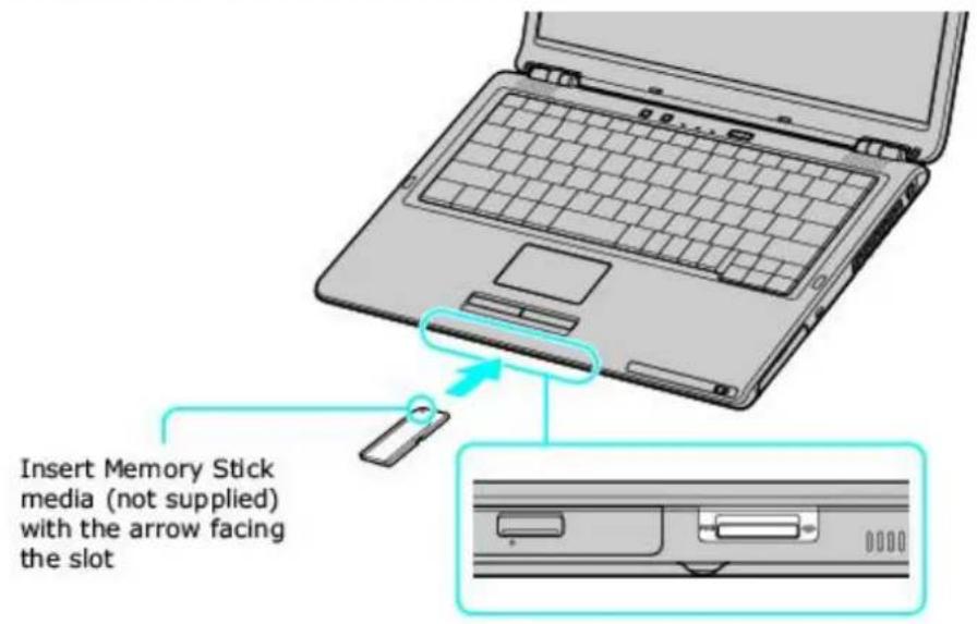 Insert Memory Stick media (not supplied) with the arrow facing the slot