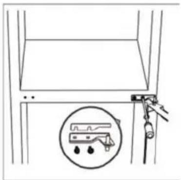 Diagram showing a hand holding a tool above a panel, with an inset illustrating a water level sensor or device.