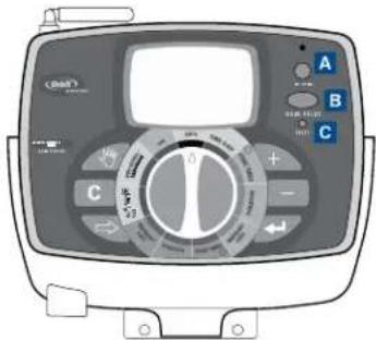 Front panel of a medical device with labeled buttons and control dial, showing measurement ranges and function buttons.