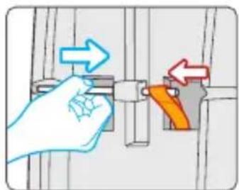 Diagram showing hand holding a mechanical component with directional arrows indicating movement or force direction
