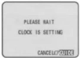 PLEASE WAIT CLOCK IS SETTING CANCEL LT GUIDE