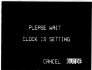 PLEASE WAIT CLOCK IS SETTING CANCEL GUIDE