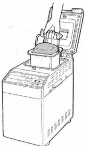 HITACHI HBB101 - When baking has been completed, remove the bread pan from the bread maker. - 1