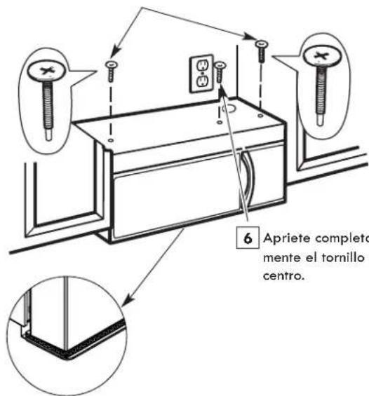 6 Apriete completa mente el tornillo o centro.