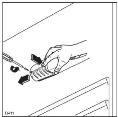 Line drawing of a hand holding a tool with arrows indicating movement or force (no text or symbols)