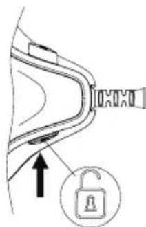 Diagram showing a car seatbelt buckle with an open lock icon and directional arrow indicating movement or change.