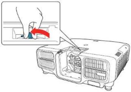 Diagram showing a hand inserting a component into an industrial lamp, with a magnified inset highlighting the component's direction.