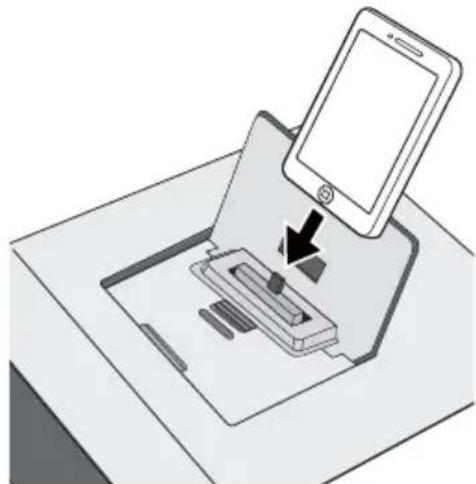 Illustration of a smartphone inserting into a device into a tray (no text or symbols)