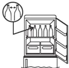 Diagram of a refrigerator with labeled compartments and an inset showing a bottle-shaped object, likely illustrating a chemical or chemical process.