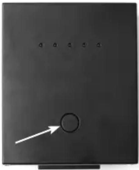 Black rectangular object with a white circular button and arrow pointing to it, no visible text or symbols.