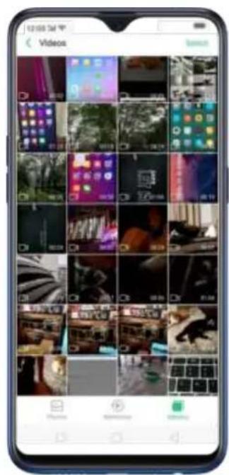 Screenshot of a mobile phone displaying a grid of video thumbnails with Chinese UI elements, likely for live or interactive content.