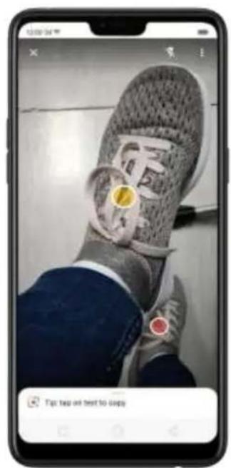 Screenshot of a smartphone displaying a photo of a woven slipper with overlaid text and a yellow badge highlighting it.