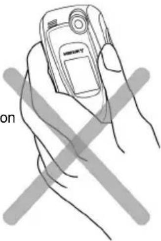 MITSUBISHI M750 - HOLDING YOUR PHONE (WHILE MAKING OR RECEIVING A CALL) - 2