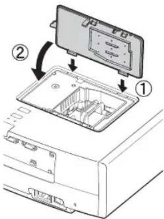 Diagram showing a device's internal structure with labeled parts and directional arrows indicating assembly or transformation.