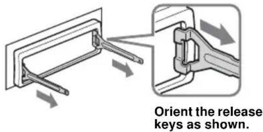 Orient the release keys as shown.