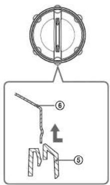 Technical diagram showing a mechanical assembly with labeled parts and directional arrows