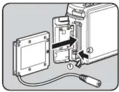 Diagram showing a device assembly with labeled parts and directional arrows indicating connection or movement.