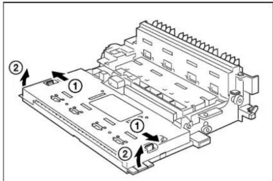 Technical diagram of an electronic device with labeled components and directional arrows indicating assembly or movement.