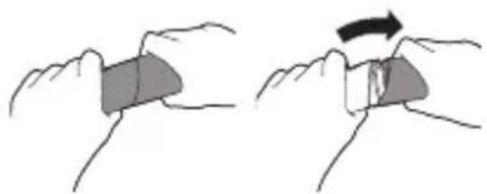 Illustration of two hands holding a rectangular object, one with a curved arrow indicating rotation (no text or symbols)