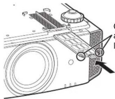 Technical diagram of a camera with labeled parts and directional arrows indicating viewing and adjustment points.