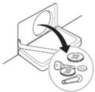 Diagram showing a mechanical component being cut with a magnified inset illustrating the process (no text or symbols present)