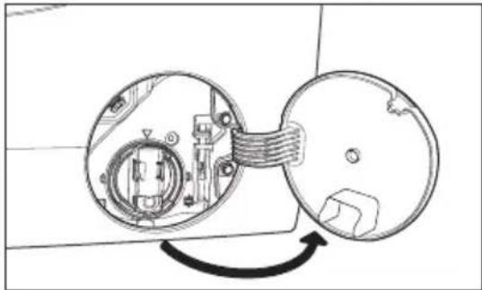 Diagram of a mechanical device with internal components and a rotating arrow indicating rotation, no text or symbols.