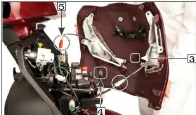 Labeled diagram of a motorcycle interior showing internal components and parts with numbered annotations