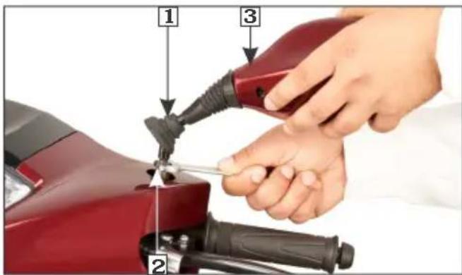 Instructional diagram showing a hand using a red electric vehicle to adjust the plug into a black plug, with labeled parts 1, 2, and 3.