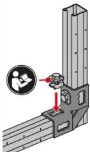 Diagram showing a mechanical assembly with a magnified inset highlighting a person using a tool, likely for safety or repair instructions.