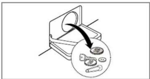 Diagram illustrating a mechanical device with a magnified view of internal components, showing parts being extracted or converted.